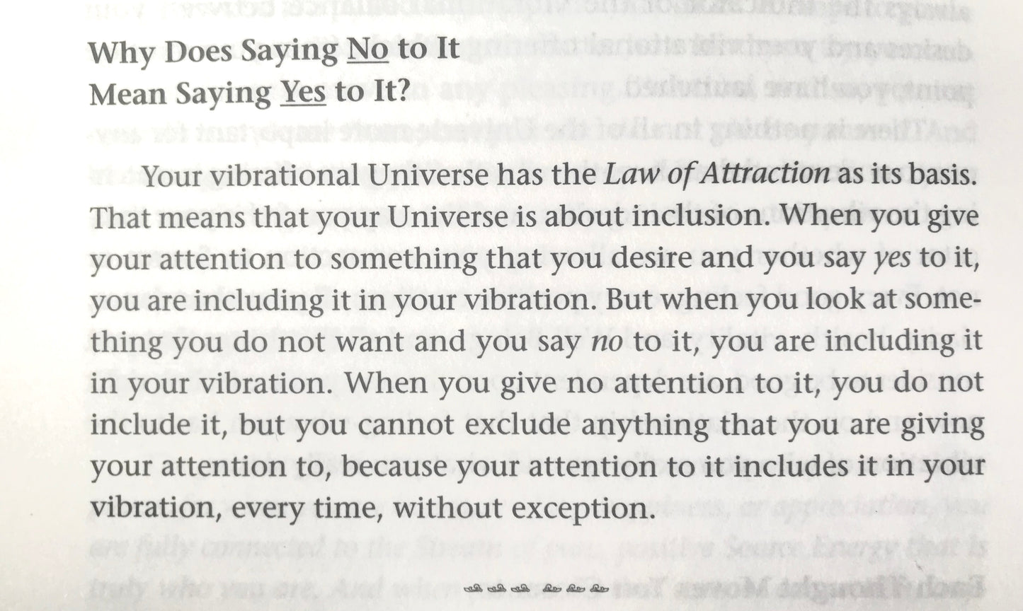 Text on a white background explaining the Law of Attraction.