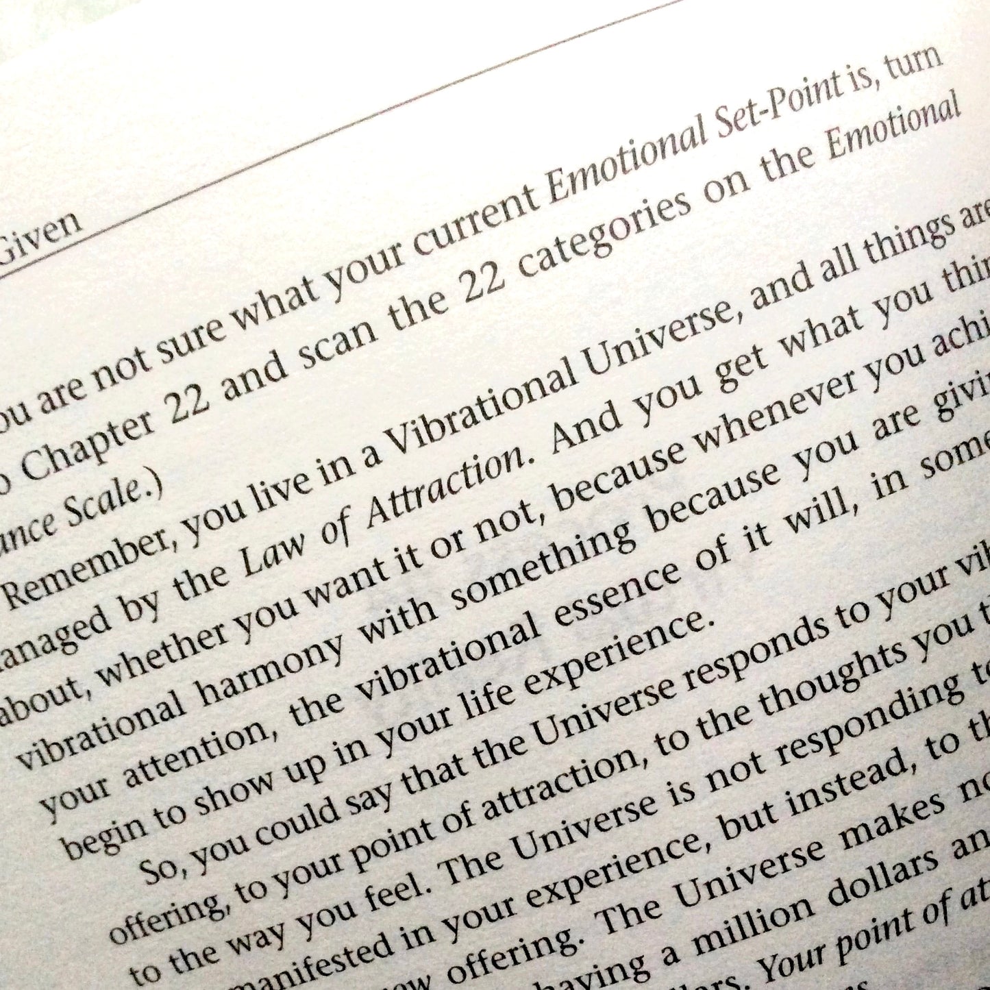Text from a book or document discussing the Law of Attraction and vibrational essence.