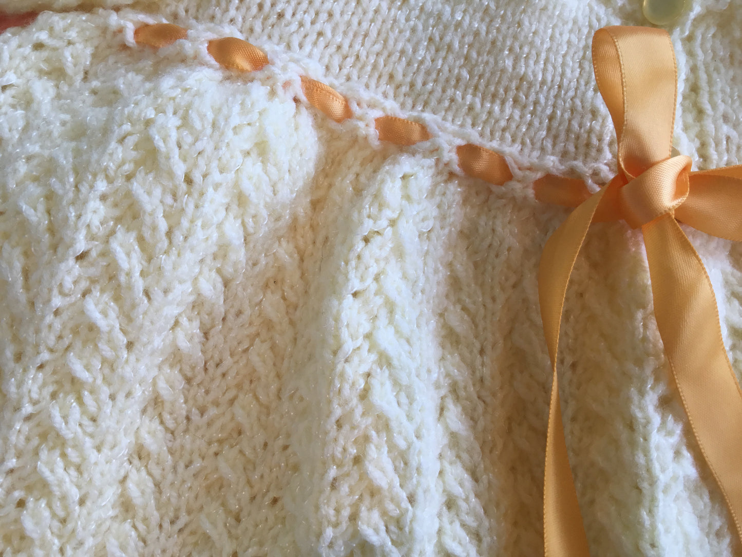Flat lay - showing close up of baby layette set - ‘Created by Lel’ - Local Artisan