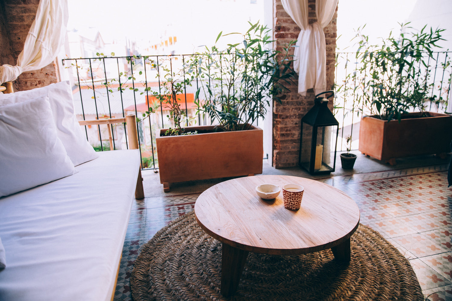 Sofa And Coffee Table On Large Balcony - The Nomad Barista by Brodie 