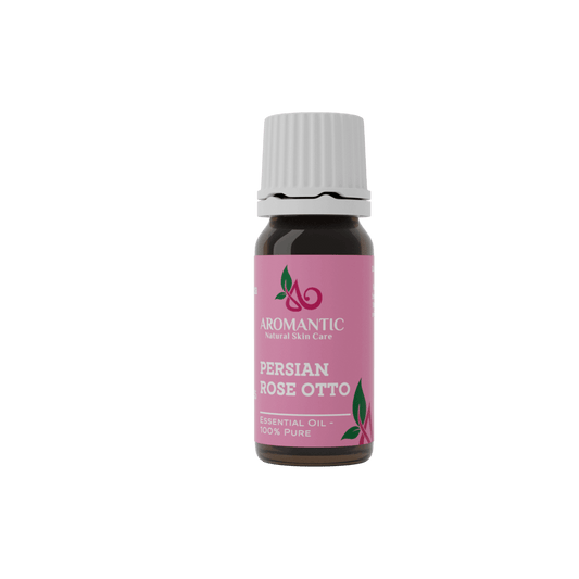 Bottle of Aromantic Persian Rose Otto essential oil on a white background