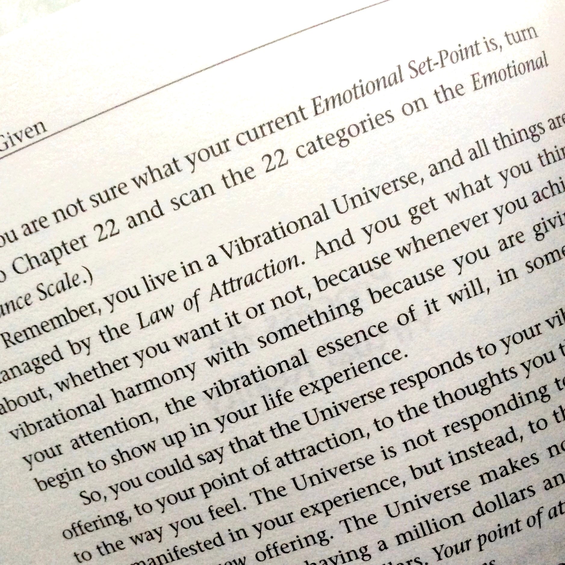 Text from a book or document discussing the Law of Attraction and vibrational essence.