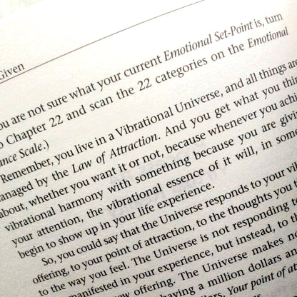 Text from a book or document discussing the Law of Attraction and vibrational essence.