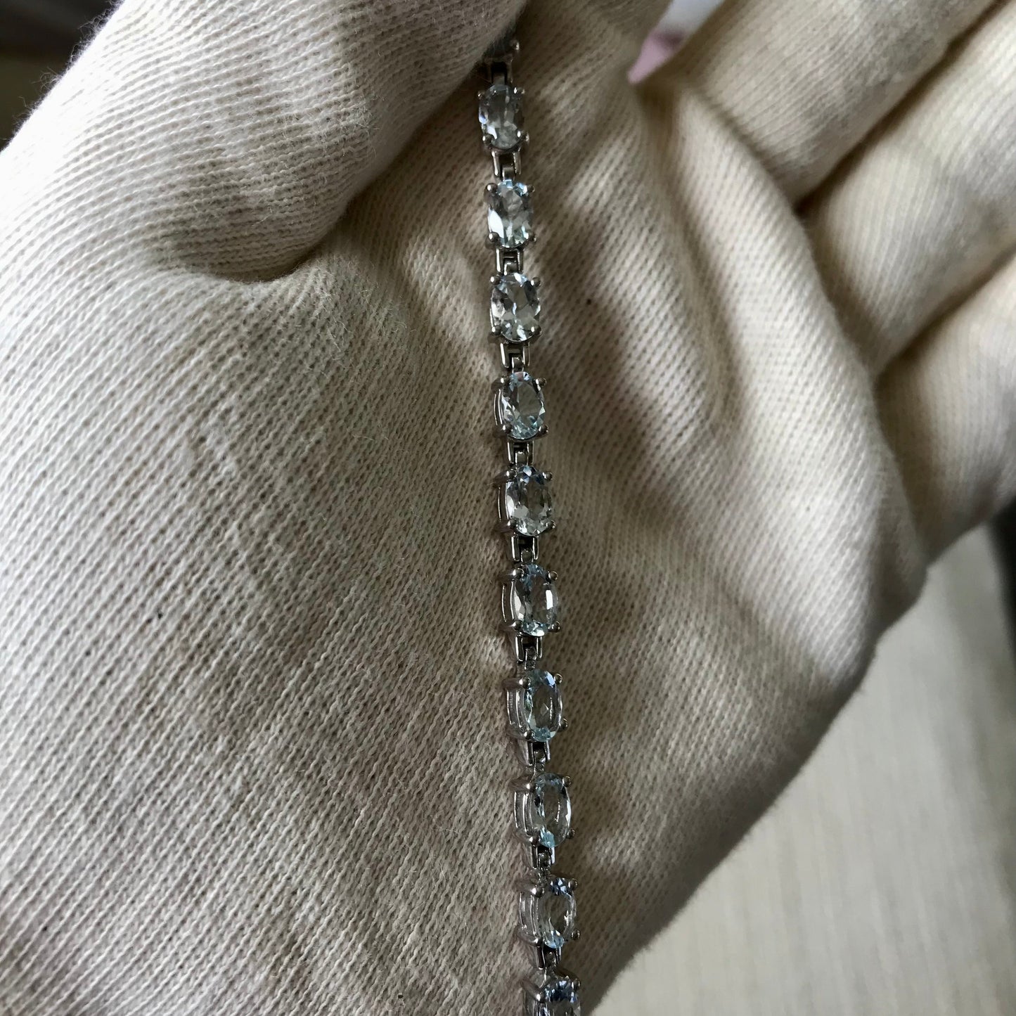 Limited Edition, Gem & Sterling Silver Bracelet made with Brazilian, Pedra Azul, Aquamarine Gemstones held in natural light 
