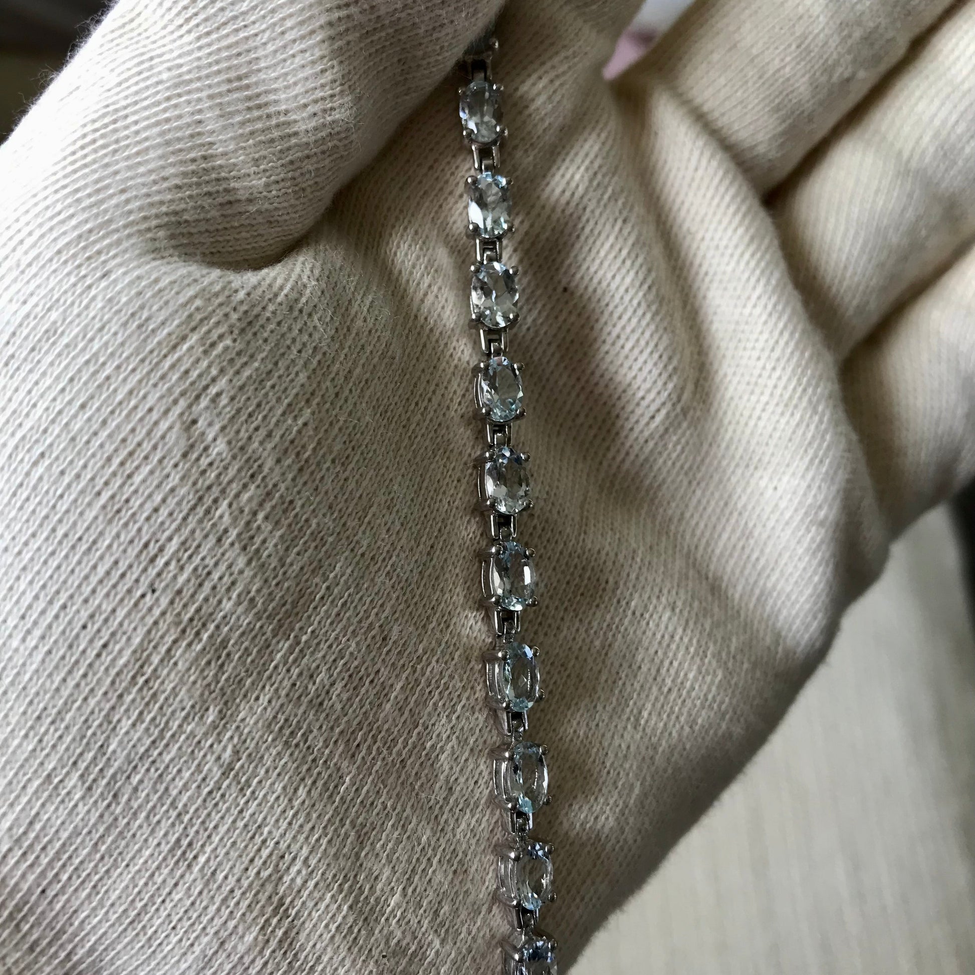 Limited Edition, Gem & Sterling Silver Bracelet made with Brazilian, Pedra Azul, Aquamarine Gemstones held in natural light 