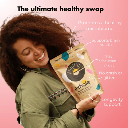 Woman holding an Exhale product with health benefits listed on a pink background