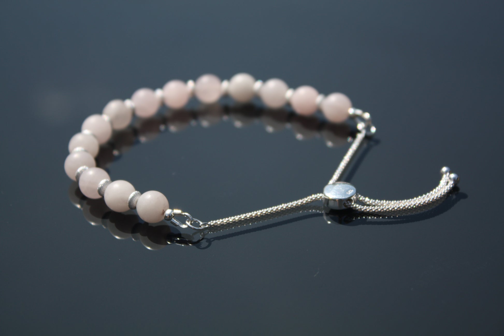 'Pink Stardust' - Frosted Rose Quartz/Sterling Silver | Bracelet showing beads, chain ,and slider fastening  | made by Hollie Cora 
