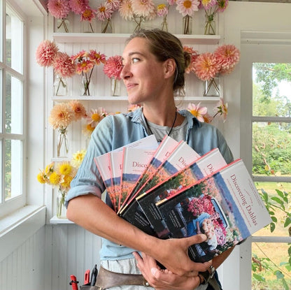 The author in her studio in front of her farm grown dahlias | Floret Farm Discovering Dahlias  