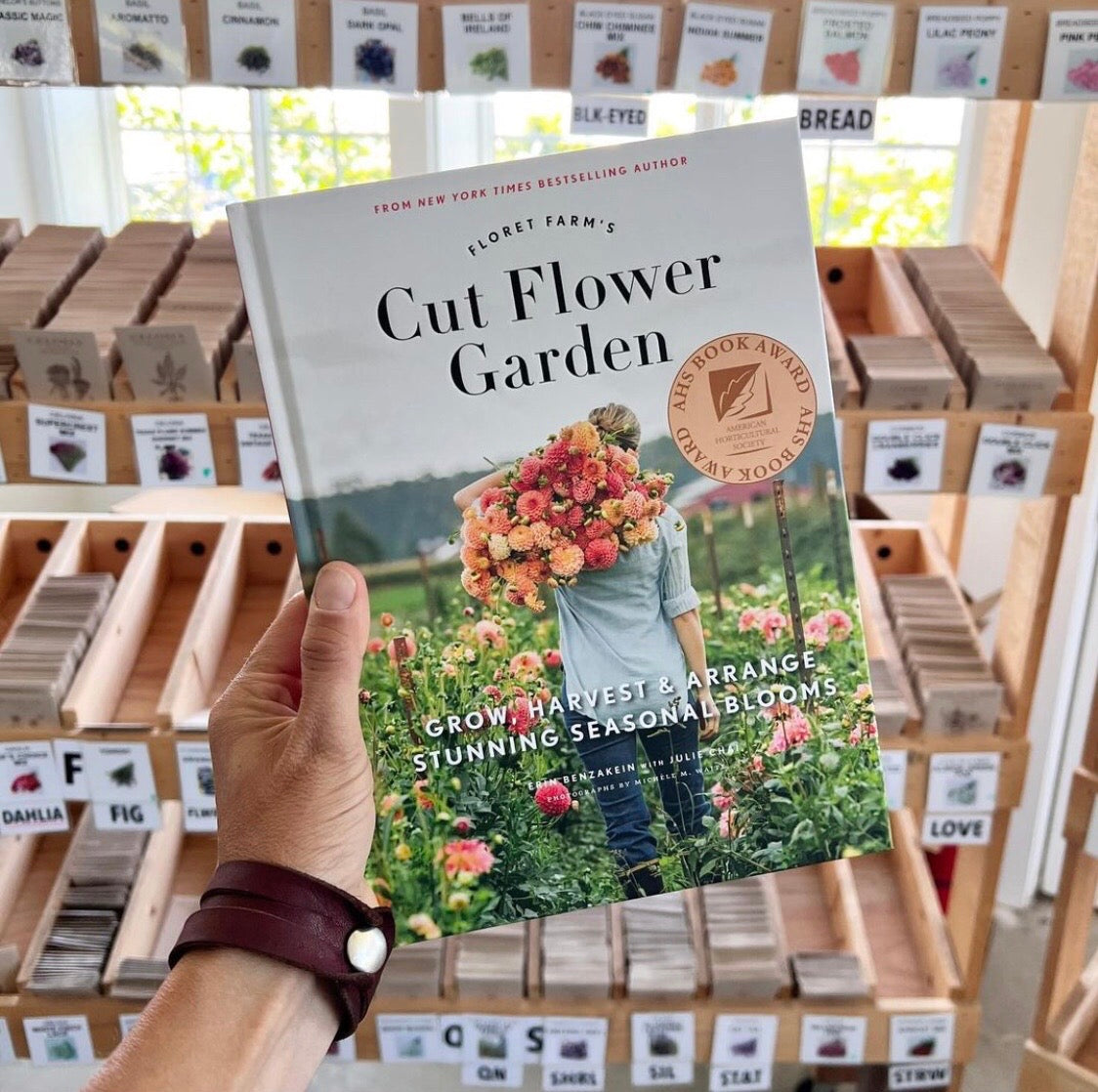 Floret’s Cut Flower Garden book, in front of Floret seed packs 