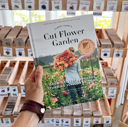 Floret’s Cut Flower Garden book, in front of Floret seed packs 
