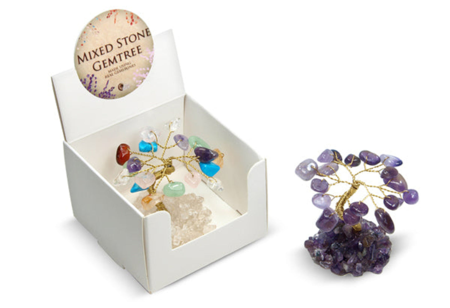 A mixed stone gemtree crystal tree figurine shown both inside its white display box and standing outside on a white background. The tree features a gold-colored metal wire structure adorned with various colored gemstone chips, mounted on a purple amethyst geode cluster base.
