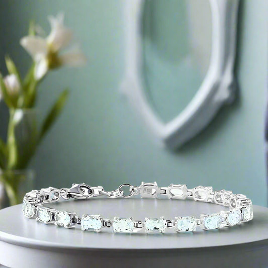 A Limited Edition, Gem & Sterling Silver Bracelet made with Brazilian, Pedra Azul, Aquamarine Gemstones (with AI background)